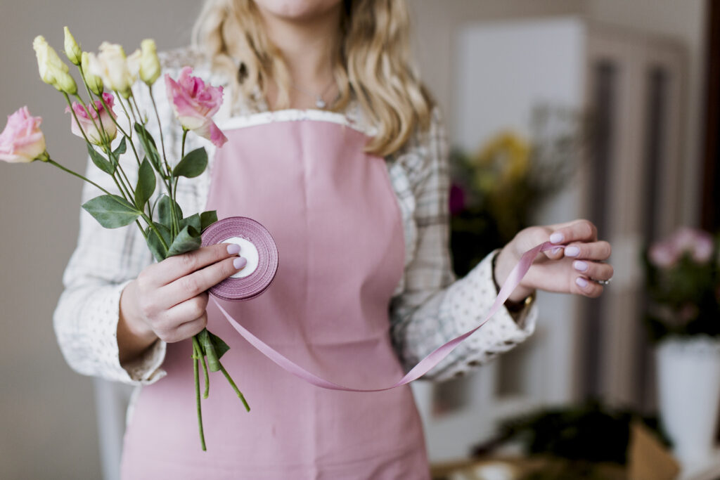 woman-with-roses-ribbon